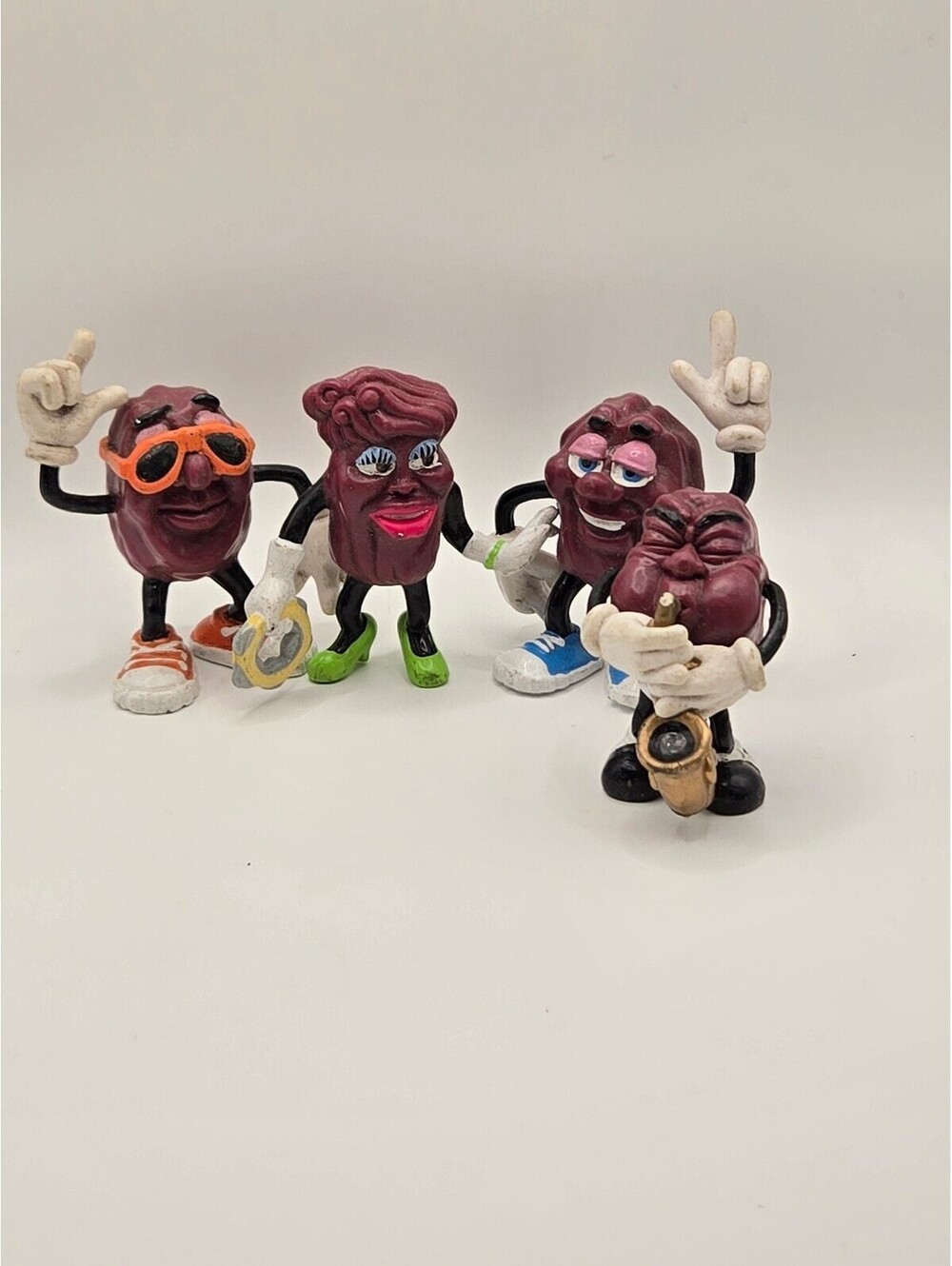 Vintage 1987-1988 California Raisins PVC Figures (Lot of 4)